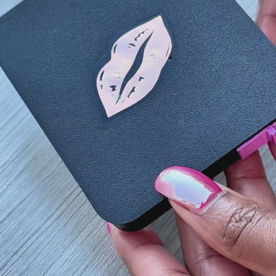 video of diamond art tray with baby pink lips on the lid being used