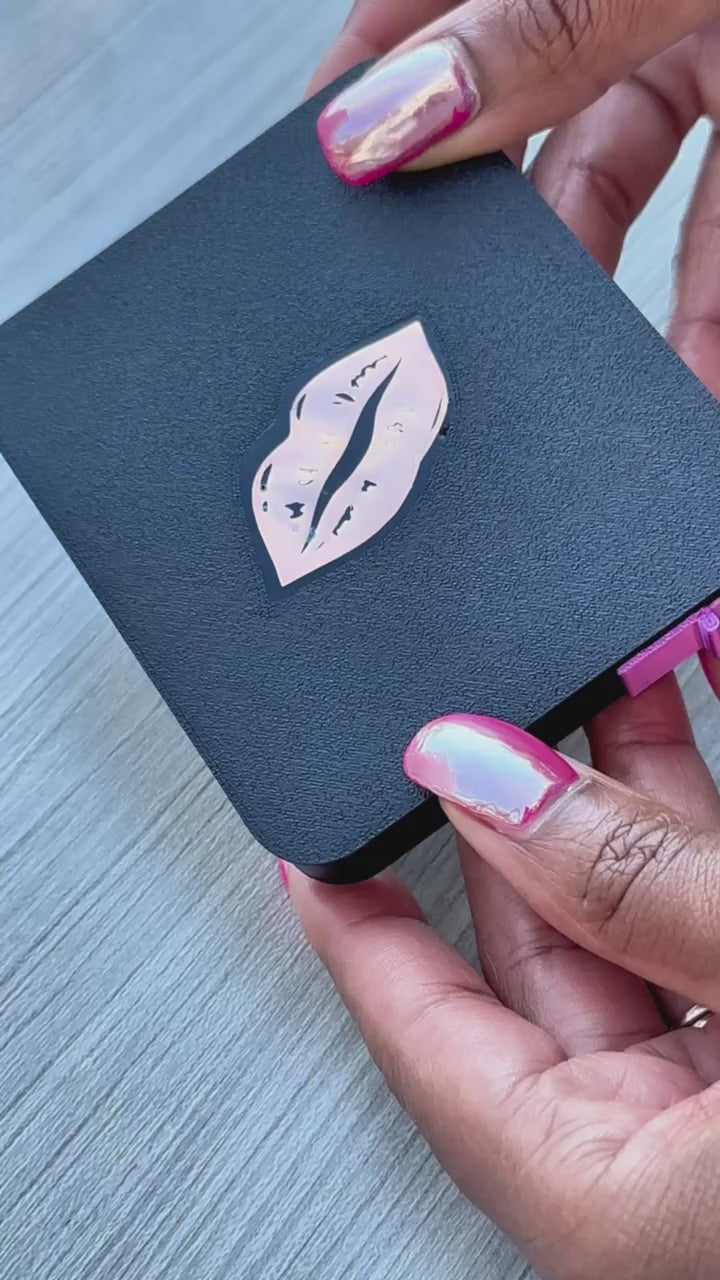 video of diamond art tray with baby pink lips on the lid being used